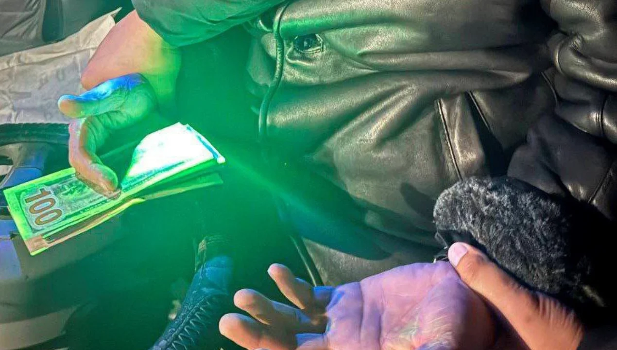 Firibgarlikda gumonlangan advokat tezkor tadbirda ushlandi